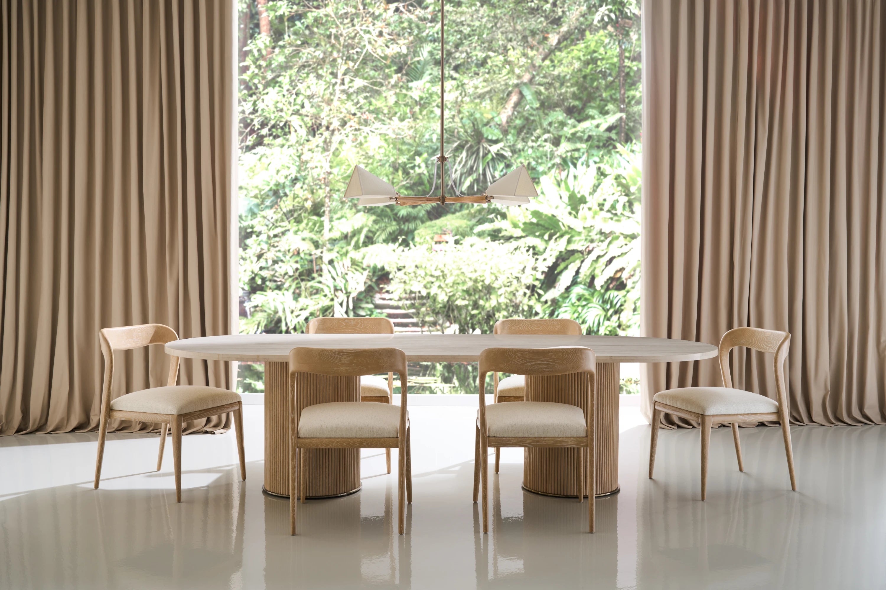 Rhythm  Oval Stone Top Dining Tbl in room - angle 1